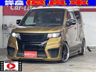 WAGON　R　STINGRAY　ワゴンＲ　スティングレー　リミテッド　✨見た目最高！！ワゴンＲスティングレーフルカスタム！！カスタム総額50万円以上😲総合評価優良車！！納車時新品タイヤ！！車検2年付✨ 💎ゴールドⅡオールペン！！🌈K-BREAKフルエアロ&4本出しマフラー&WORK17インチAW&車高調🌈内外装共にフルカスタム！！目立ち度ナンバーワン🤩クラリオンHDDナビ地デジフルセグ📺走行中視聴可！！マーベリックウーファー付きで音響もバッチリ！！🎤社外LEDヘッドライト&社外テールで夜間の視認性も抜群👀月々支払2万円台～😲🎥＂高画質ムービー有▶