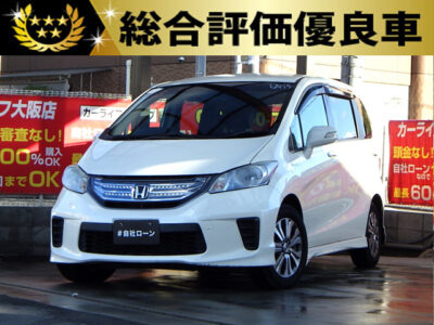 FREED　フリードハイブリッド　ジャストセレクション　【総合評価優良車】　～3列シート6人乗りtype～　ハイブリッド×コンパクト💎　ハーフレザーシートでラグジュアリー感満載🌃　キャプテンシート＆ウォークスルー可能で車内の移動も楽々可能💺　3列目を跳ね上げればお荷物もたくさん載ります📦　両側パワースライドドアで乗り降りも便利ですね😉　🌜大阪店専用HPも要チェック❗carlifegroup.jp で検索🕵️‍♂️　Instagram・Twitter・TikTokも随時更新中❗❗🌛《1年保証付》