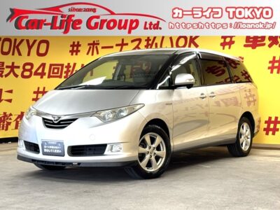 ESTIMA　HYBRID　エスティマHV　G 【4WD】純正HDDナビ🗾Bluetooth・ＣＤ・ＤＶＤ💿🎵🎶駐車時など安心ラクラクなバックカメラ付き📹純正フリップダウンモニター付きで後部座席も快適です😃大人気7人乗り‼ウォークスルー可能で大人数でのお出掛けも楽々😊ビルトインETC付きで高速道路・長距離運転も楽々快適👍ＨＩＤヘッドライト＆フォグランプで夜間も明るく安全走行💡両側パワースライドドアーで小さなお子様の力でも後席の乗り降り楽々です🤱🌈TOKYO店専用HPにて更新中❗ carlifegroup.tokyo.jpで検索🕵️‍♂️🌛《1年保証付》