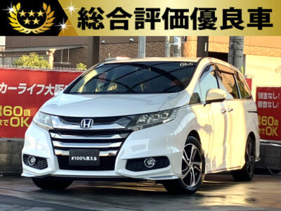 オデッセイ　アブソルートX　【総合評価優良車】　～7人乗りtype～　SDナビでBluetoothオーディオ接続可能🎵　ハーフレザーシートのキャプテンシート＆オットマンでラグジュアリー感も抜群です✨　運転席側はパワーシート搭載🙌　3列目床下格納シートでお荷物もたくさん載ります📦　ファミリー様にも大変好評の上級ミニバンです🤩　🌜大阪店専用HPも要チェック❗carlifegroup.jp で検索🕵️‍♂️　Instagram・Twitter・TikTokも随時更新中❗❗🌛《1年保証付》