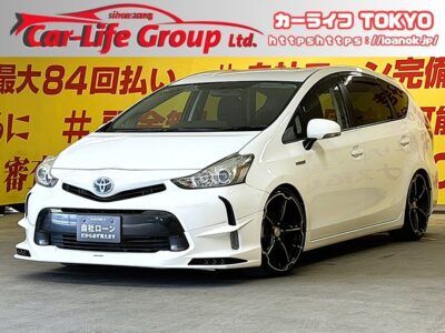 PRIUSα　プリウスα 　SLセレクション　【後期型】【カスタム】【車検２年付】ピロアッパー付車高調＆アルジェノン・マットブラック１９インチＡＷ＆ＴＲＤフロントハーフエアロ装着でスポーティーに決まってます😍👌純正ＳＤナビ🛣️地デジTV 📺CD📀Bluetooth📱ビルトインＥＴＣ装備でロングドライブなど高速走行時快適🚗✨ ステアリングスイッチ付でオーディオ操作も簡単楽々👆 低燃費車両なので街乗りはもちろん長距離ドライブにも最適なお車です😆シートを倒せば大容量のラゲッジルームで便利🚨🌛TOKYO店専用HPにて更新中❗ carlifegroup.tokyo.jpで検索🕵️‍♂️🌛《1年保証》